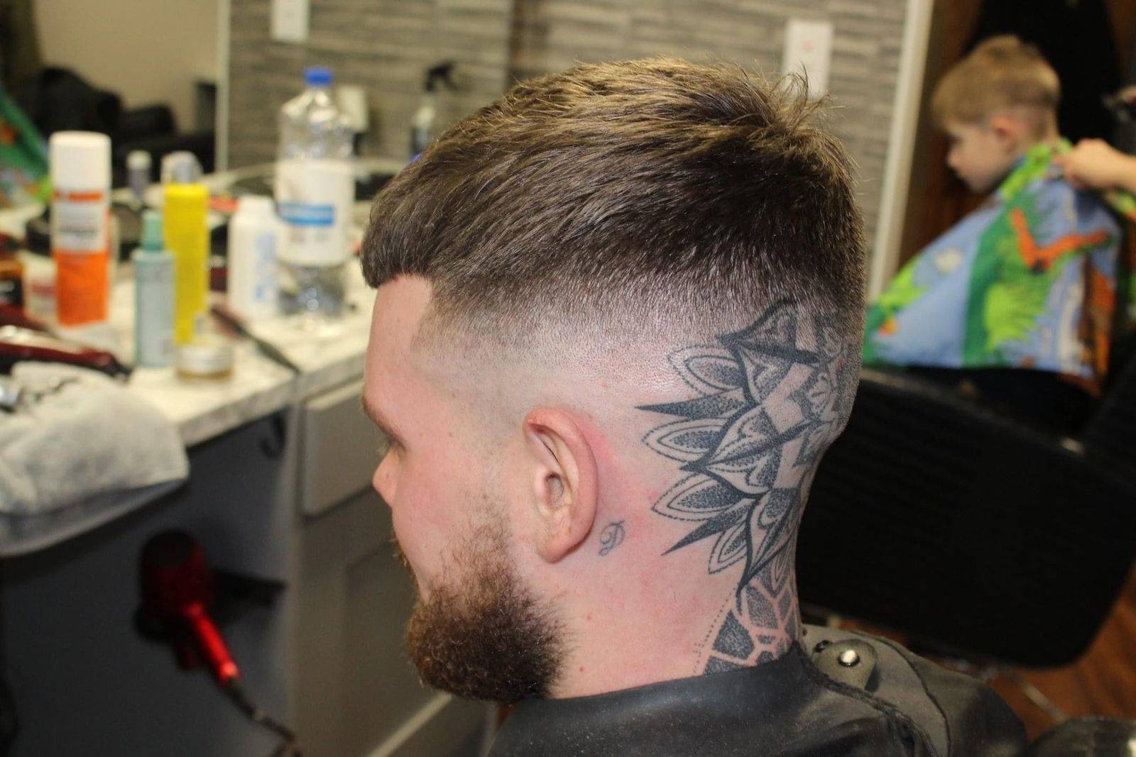 Skin fade and beard trim at a Peaky Barbers station in Knocknaheeny, Cork
